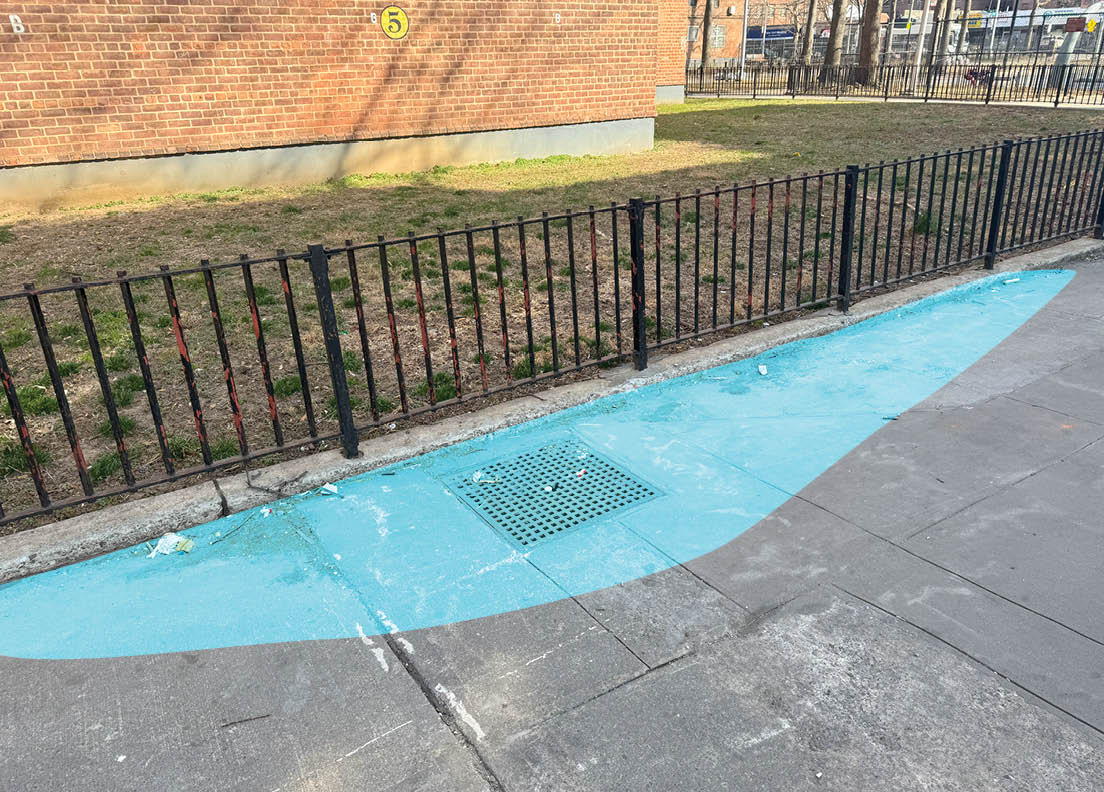 Water ponding around drainage inlets deposits accumulated debris